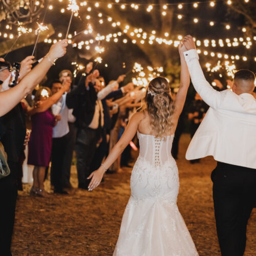 Kim + Mario Couple dancing in a beautiful garden area on the wedding night